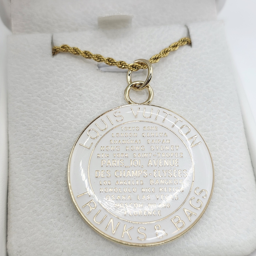 White Louis Vutton Medallion Pendant Necklace. On ATOLEA 18KT gold Plated Chain.